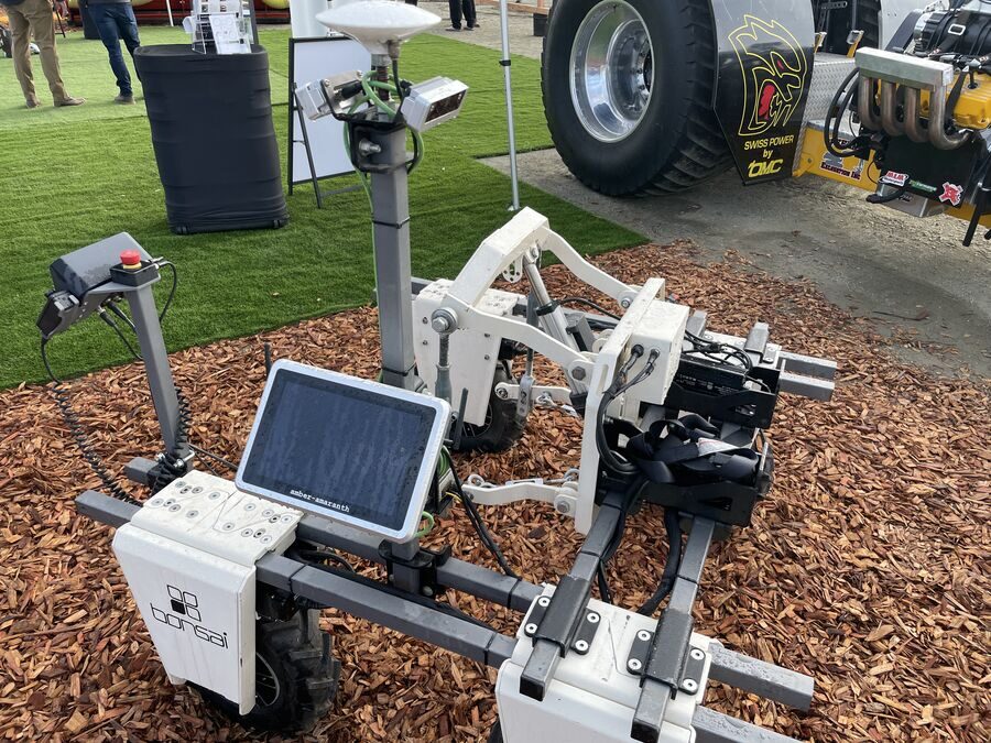 Bonsai autonomous robot close-up — sensors, tablet interface, and field navigation systems at World Ag Expo