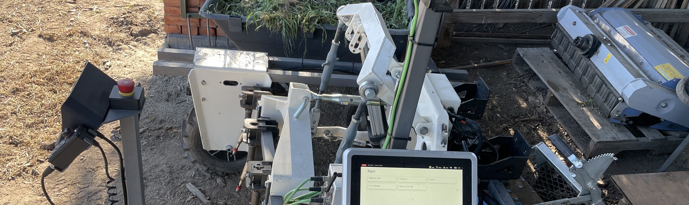 Amiga agricultural robot with implement and operator tablet — field-deployed agricultural technology